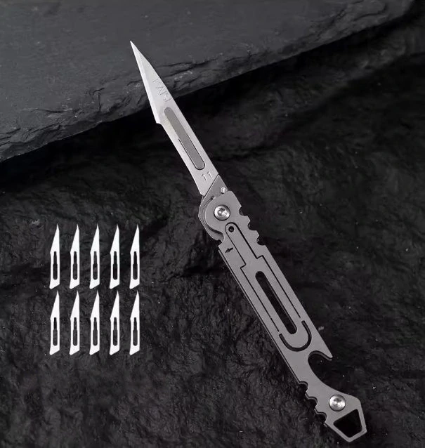 Skalpel / nůž / otvírák (skládací kapesní) z nerezové oceli s vyměnitelnými čepelemi + 10x náhradní čepelky číslo 11